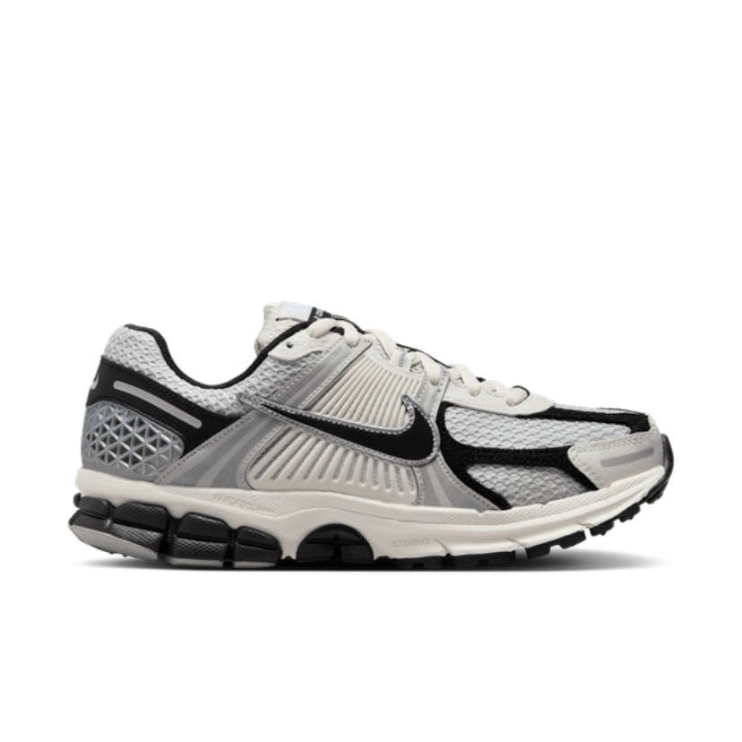 White and black athletic shoe on a white background