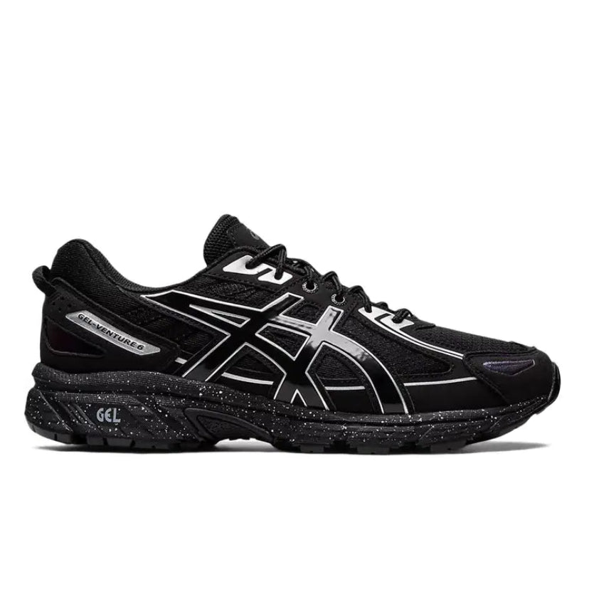 Black running shoe with white accents on a white background